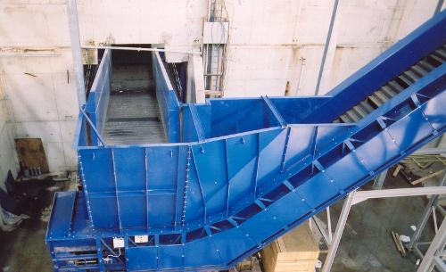 INFEED CONVEYORS FOR SCRAP AND SOLID WASTE SYSTEMS
