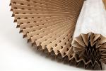 Pleated paper concertina filter with polyester media