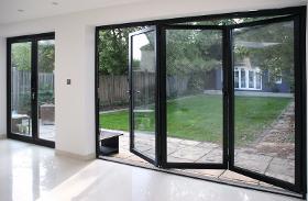 Bifold sliding window and door systems
